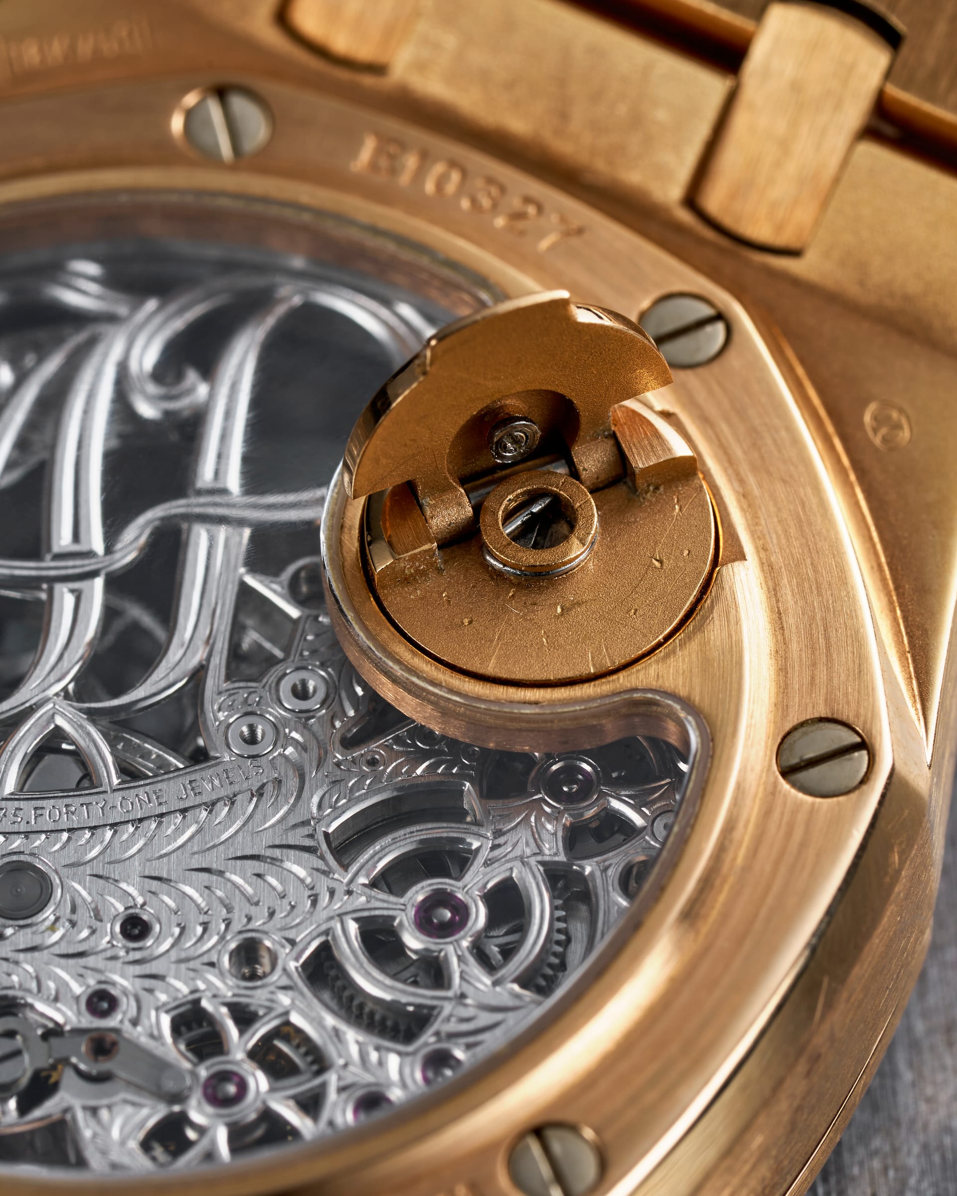 Audemars Piguet Royal Oak Tourbillon Squelette, yellow gold — Openworked gold rotor and the tourbillon cage seen through the movement.