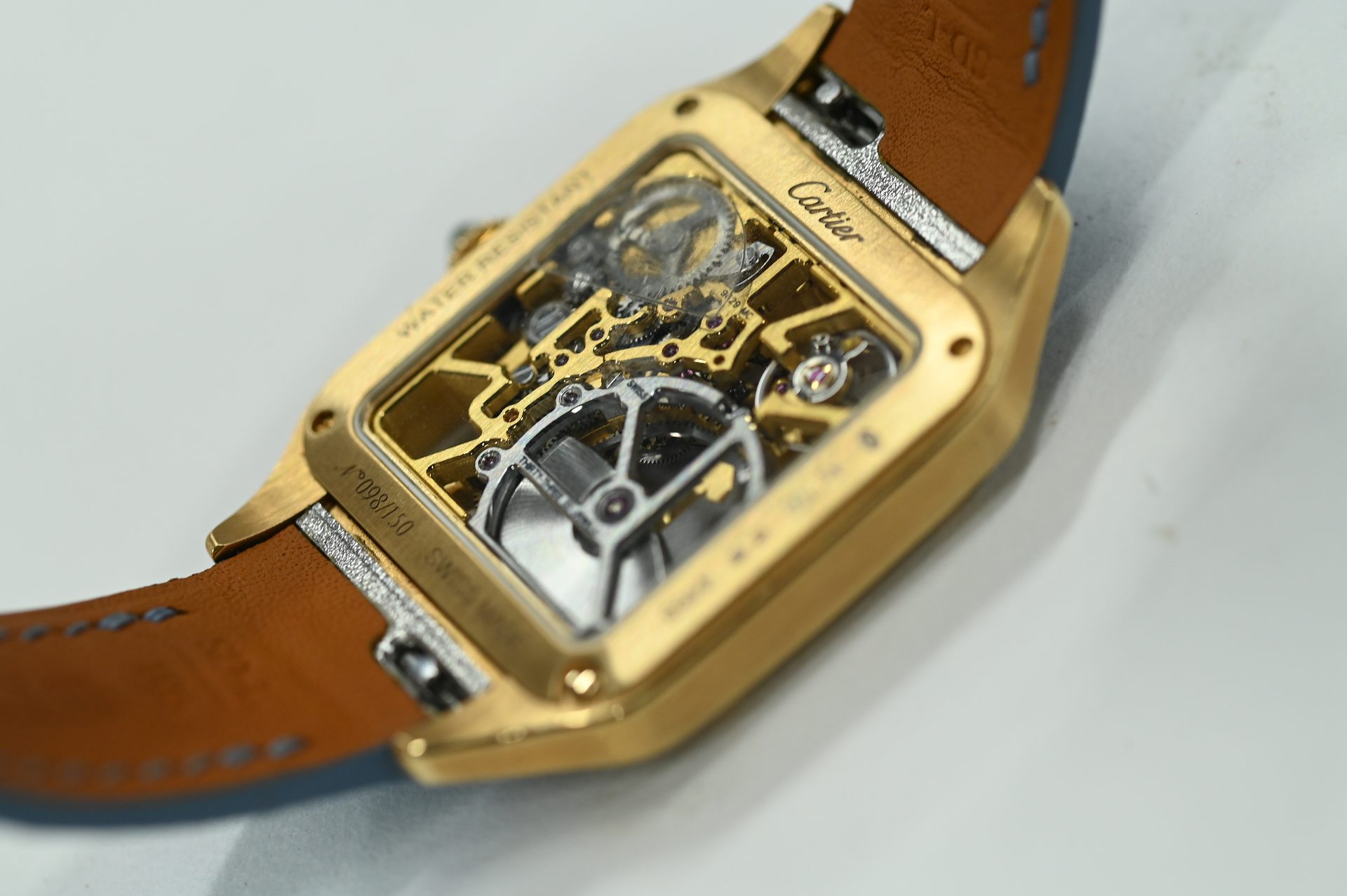 Cartier Santos-Dumont Skeleton — Three-quarter view showing case thinness and the strap attachment.