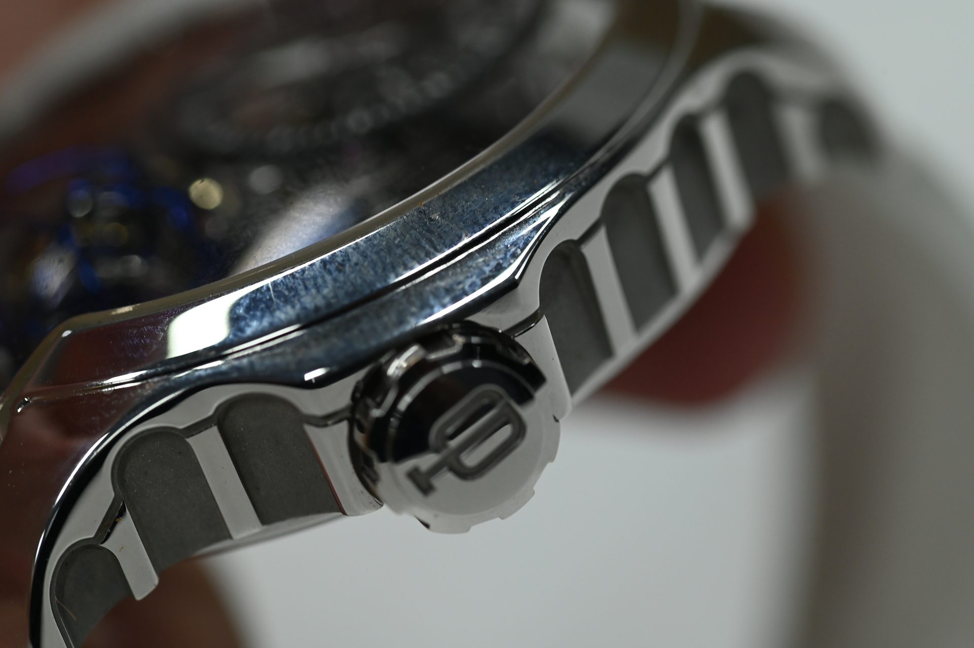 Cecil Purnell Tourbillon — Crown detail set into the flank of the case.