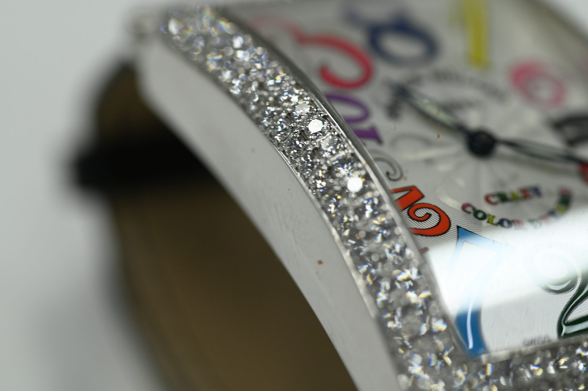 Franck Muller Long Island Crazy Colour Dreams — Diamond-set bezel following the tonneau Long Island silhouette.