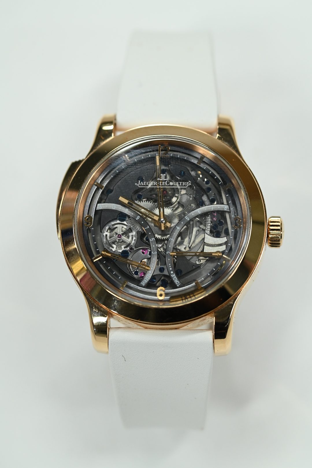 Jaeger-LeCoultre Master Grande Tradition skeletonised tourbillon in pink gold with torque and power reserve indications on a white strap