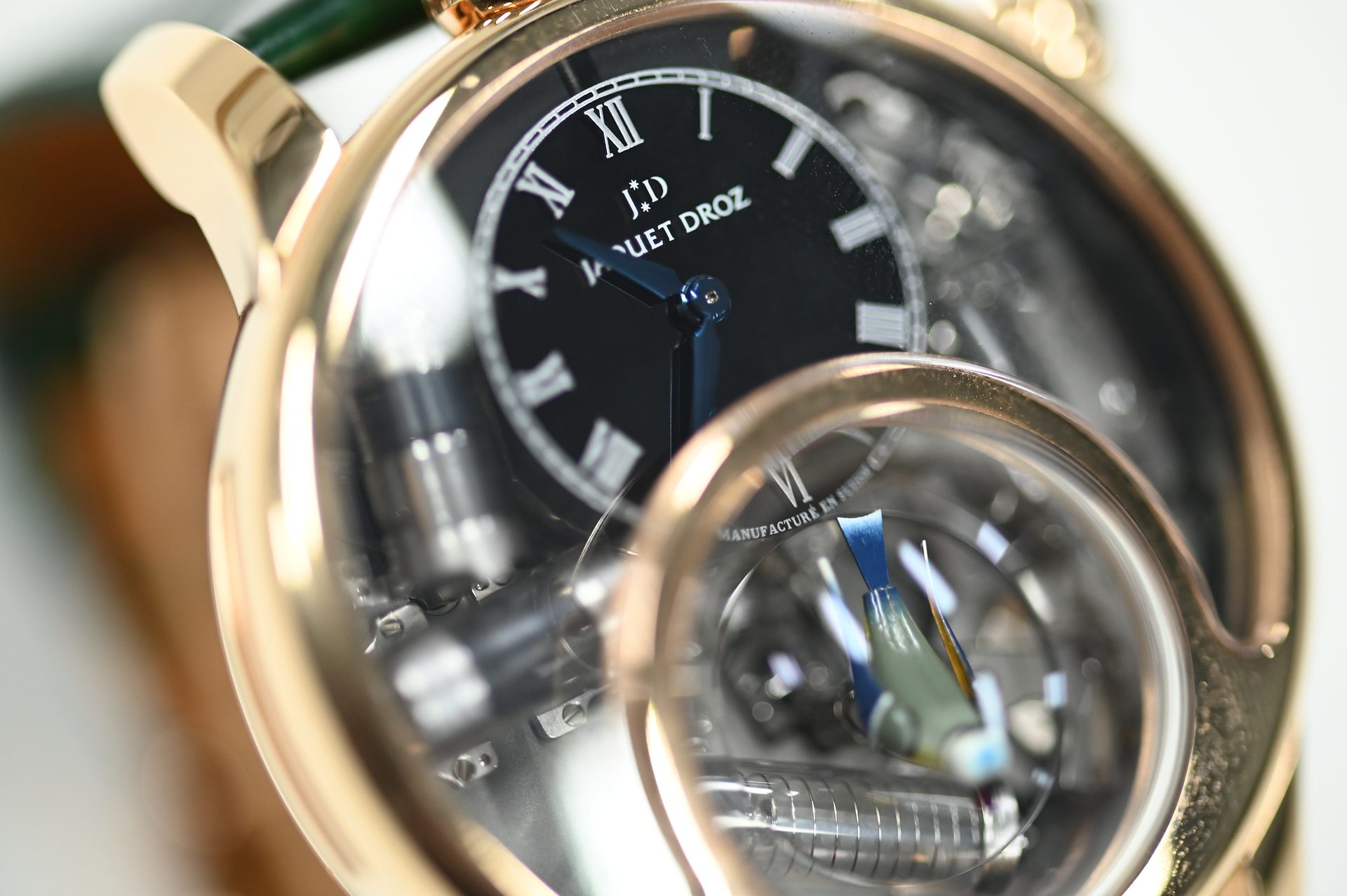 Jaquet Droz Charming Bird — Off-centre black dial beside the domed sapphire housing the singing bird automaton.