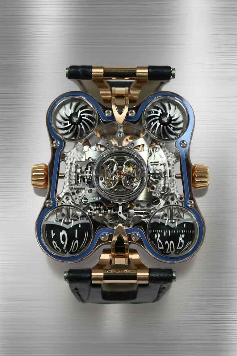 MB and F HM6 Space Pirate in red gold with blue accents, twin turbines, spherical hour and minute domes and a central flying tourbillon