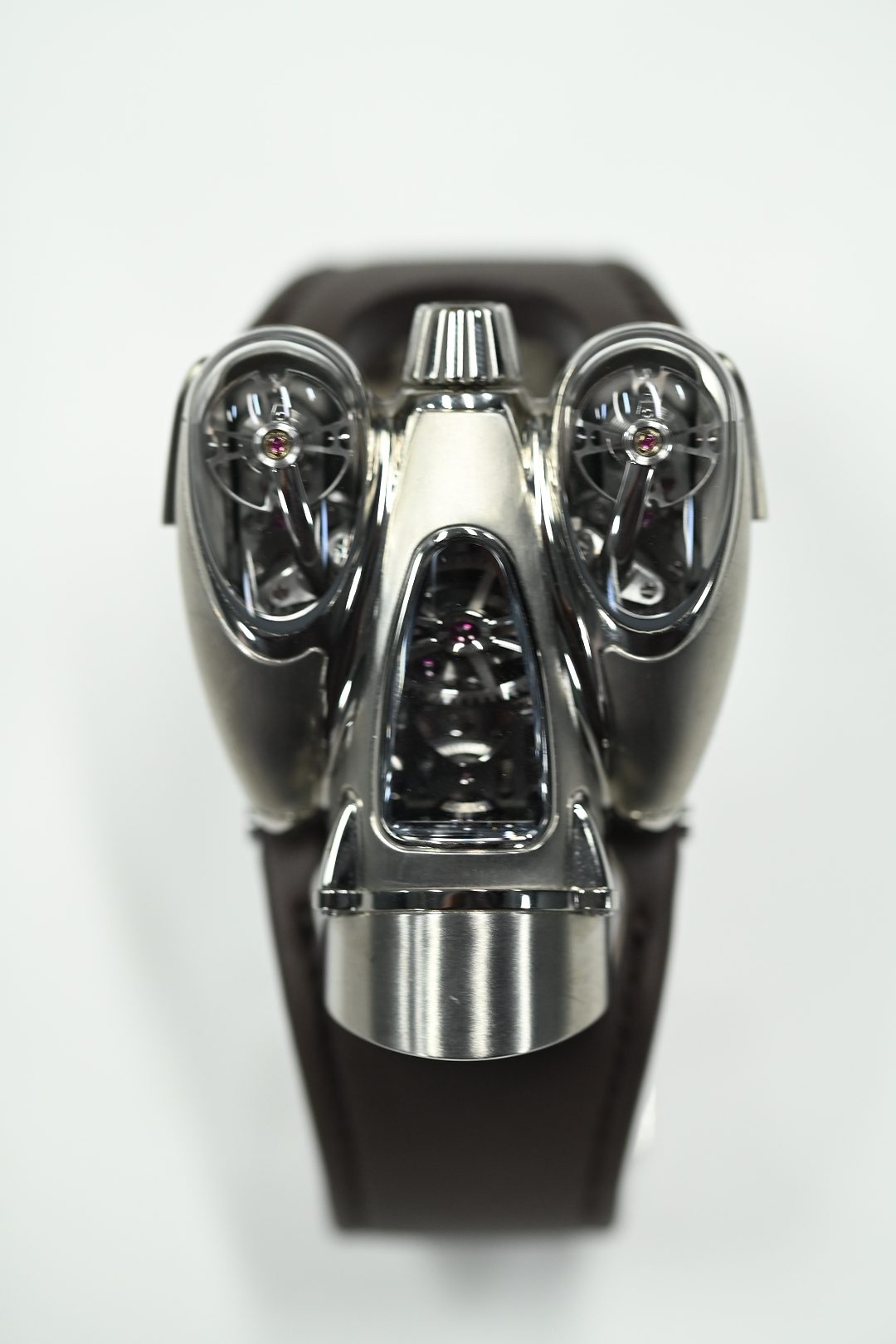 MB and F HM9 Flow in polished titanium with twin lateral pods housing balance wheels and a central planetary differential