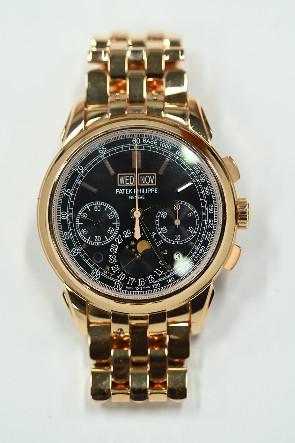 Patek Philippe Perpetual Calendar Chronograph 5270/1R — Black dial perpetual calendar chronograph in rose gold on an integrated rose gold bracelet.