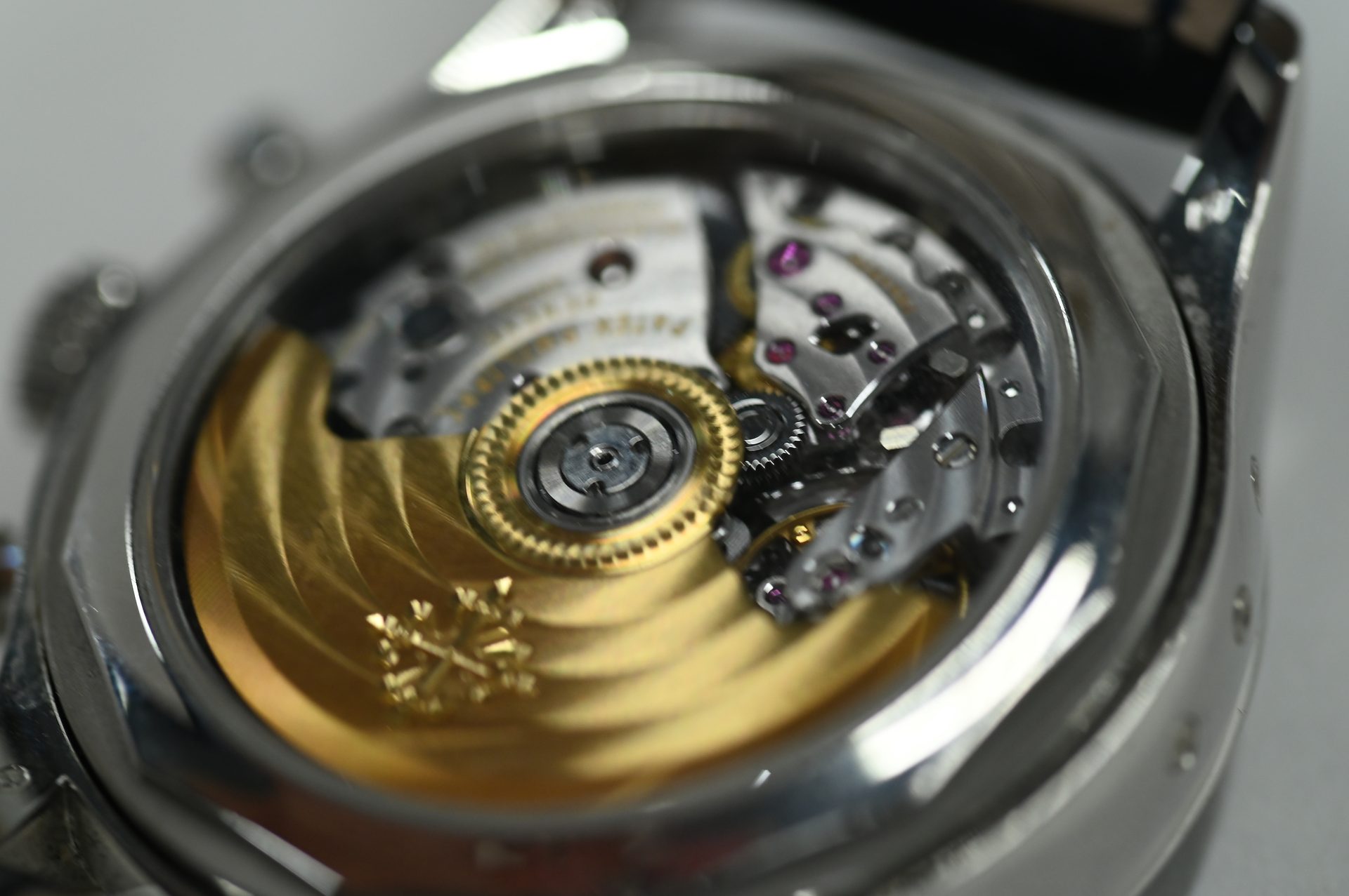 Patek Philippe Annual Calendar Chronograph, Tiffany & Co. dial — Movement detail: bevelled bridges, Geneva striping and the gold rotor.