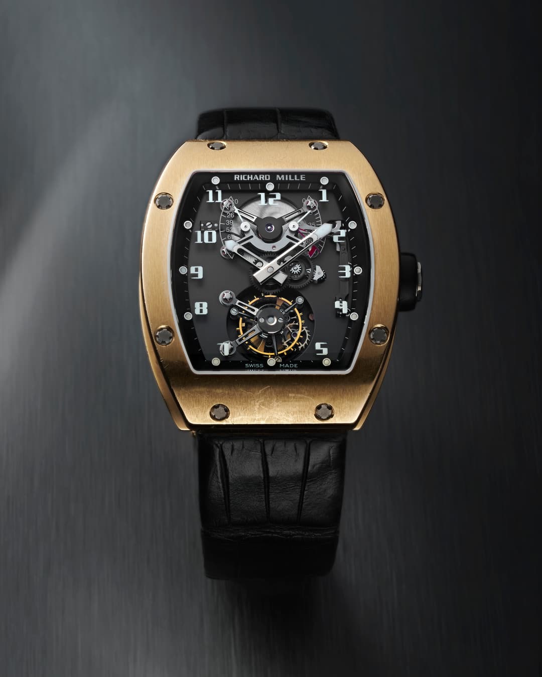 Richard Mille RM 001 Tourbillon, the first Richard Mille reference, in a tonneau case with skeletonised baseplate and visible tourbillon