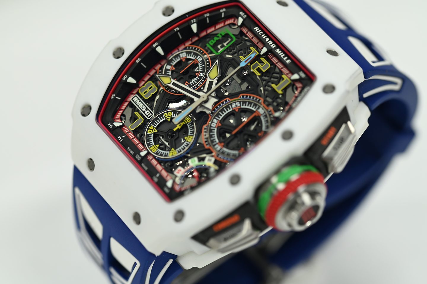 Richard Mille RM 65-01 Automatic Split-Seconds Chronograph — The full case in white composite on blue strap, skeletonised split-seconds dial.